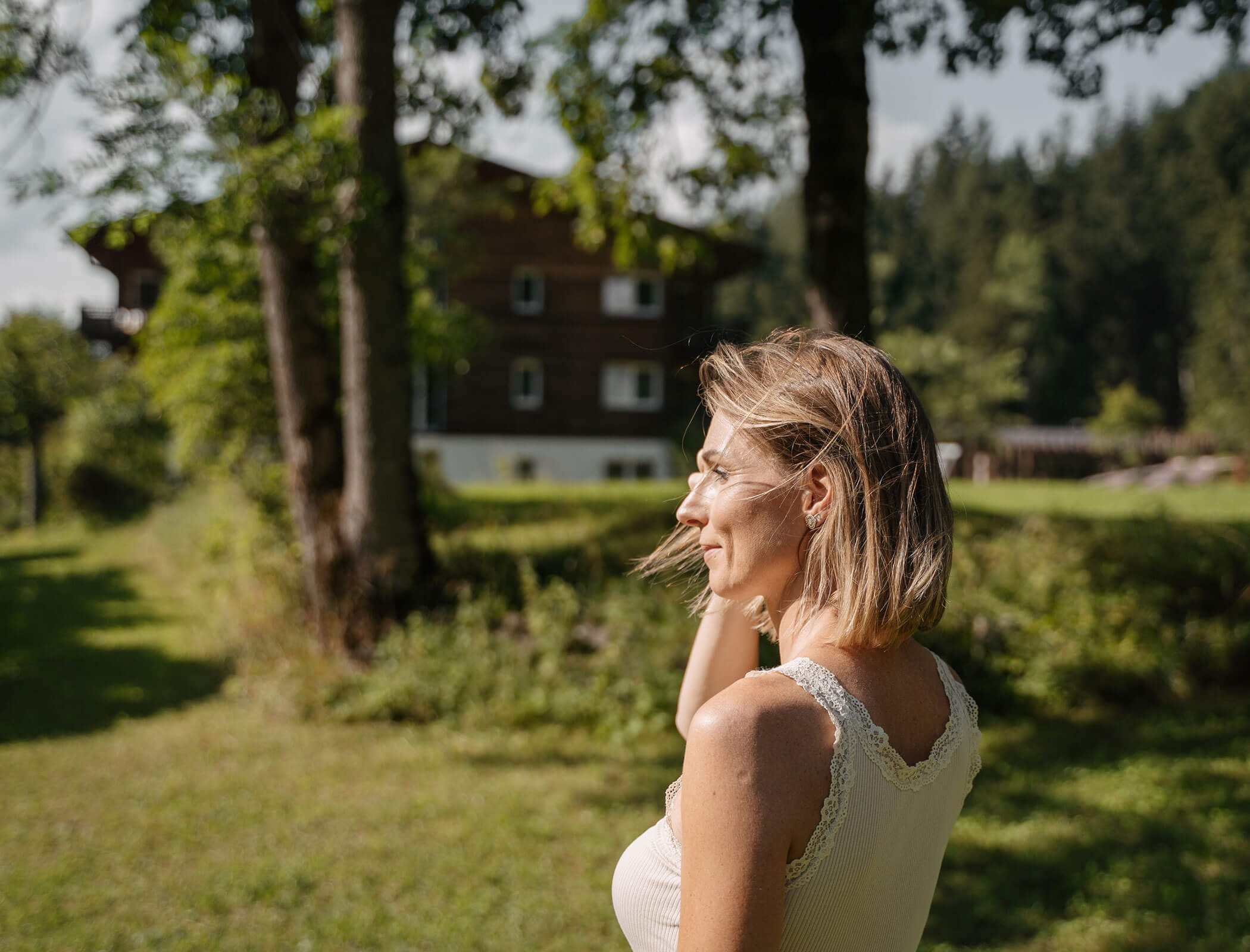 Woman on a meadow looking into the distance